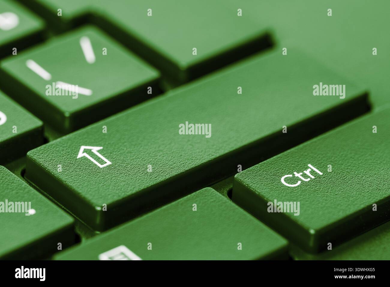 Keyboard keys close up, shift key and ctrl, IT background, in green ...