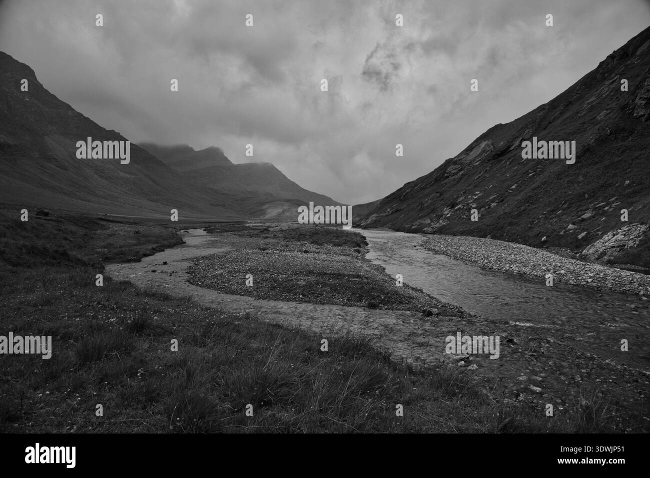 Scenic View Of A River Winding Through The Mountainous Terrain In ...