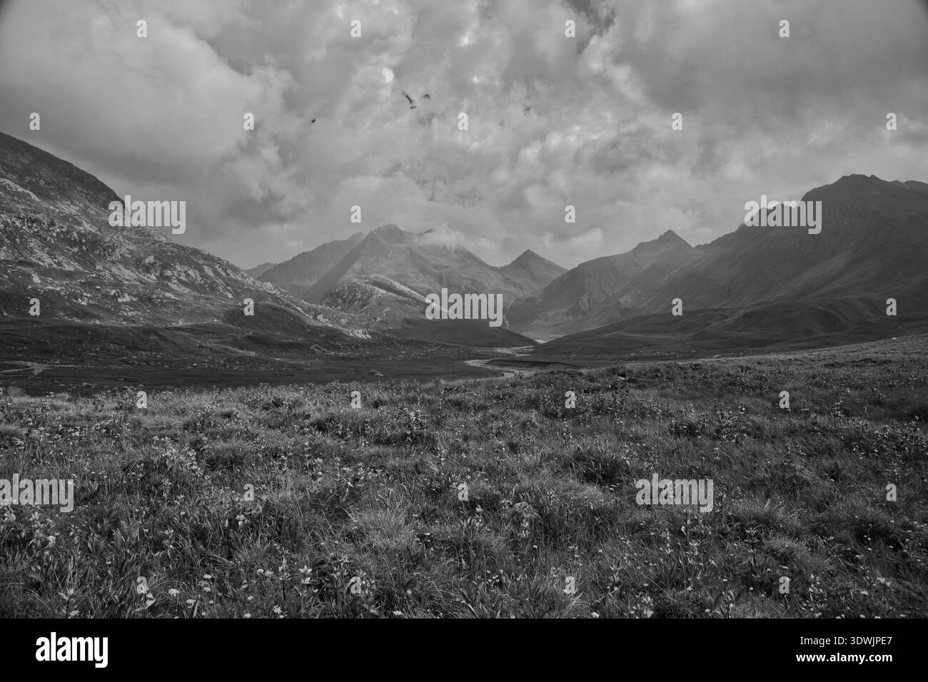 Stunning Mountain Landscape With Lush Greenery And Dramatic Clouds ...