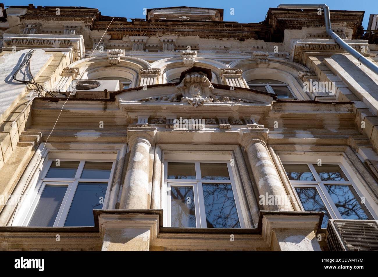 Low angle view of a 19th century Eclecticism style building needing ...