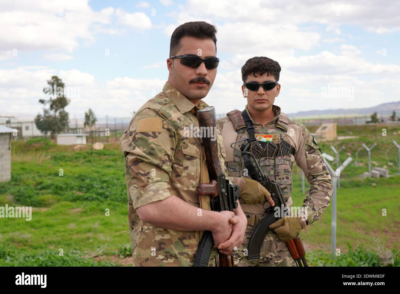 Pdki Members of the Democratic Party of Iranian Kurdistan PDKI stand at a ...