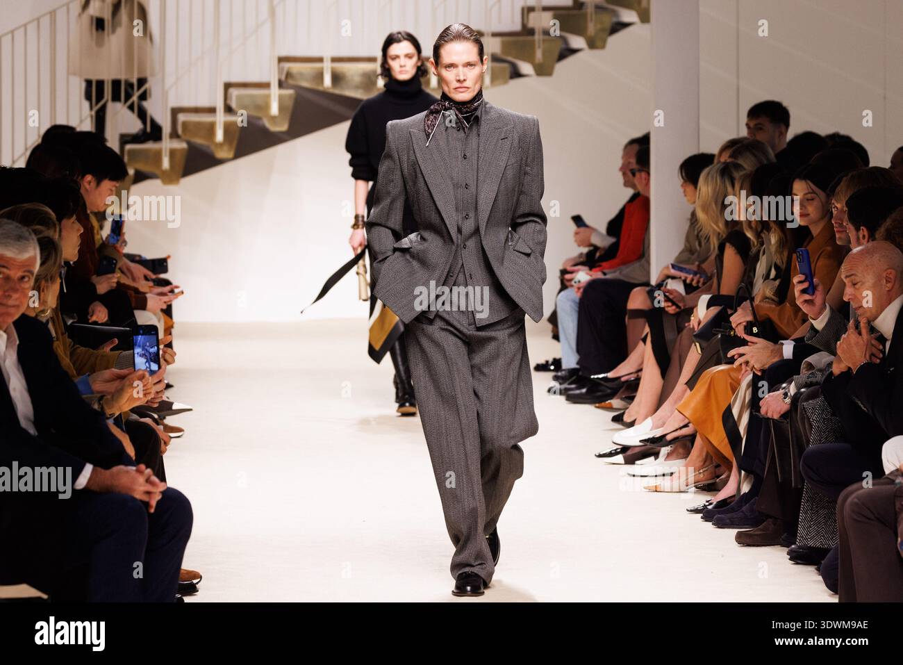 A model walks the runway at the Tod's fashion show during the Milan ...