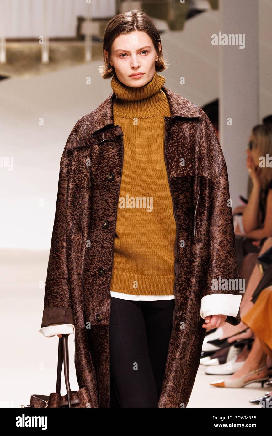 A model walks the runway at the Tod's fashion show during the Milan ...