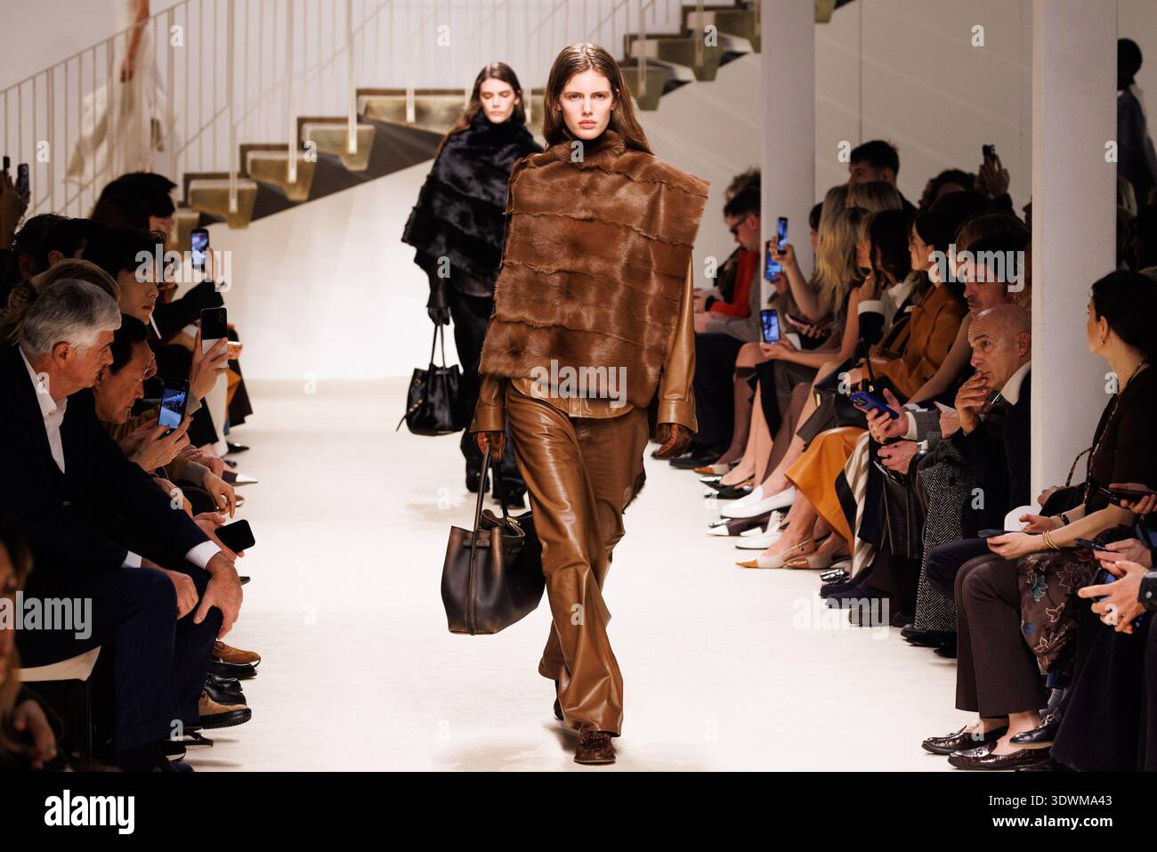 A model walks the runway at the Tod's fashion show during the Milan ...