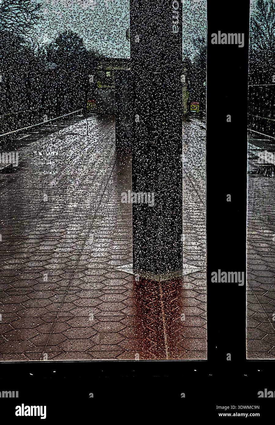 A rainy day on a train platform Stock Photo