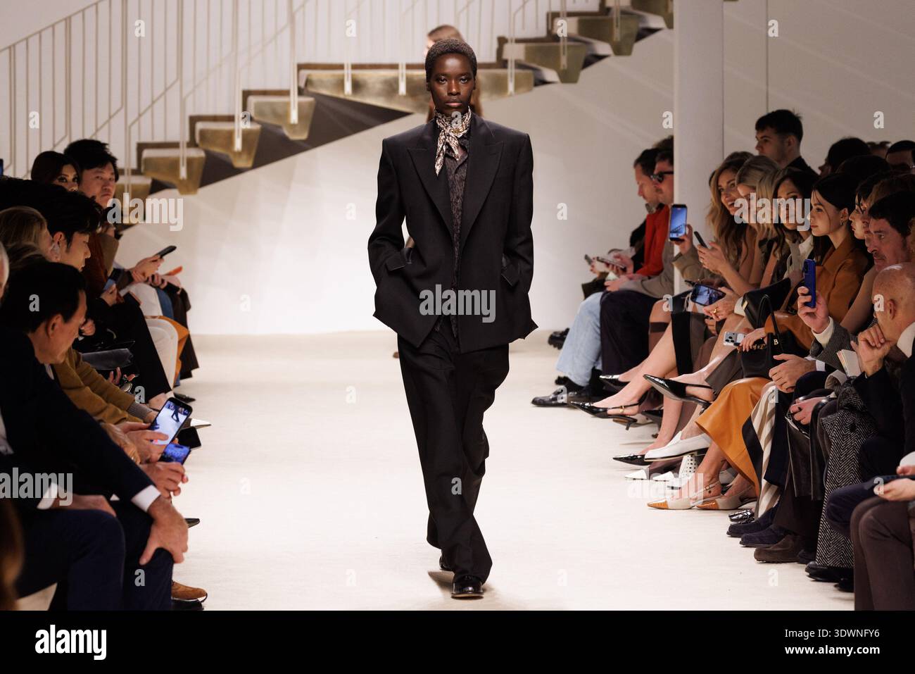 A model walks the runway at the Tod's fashion show during the Milan ...