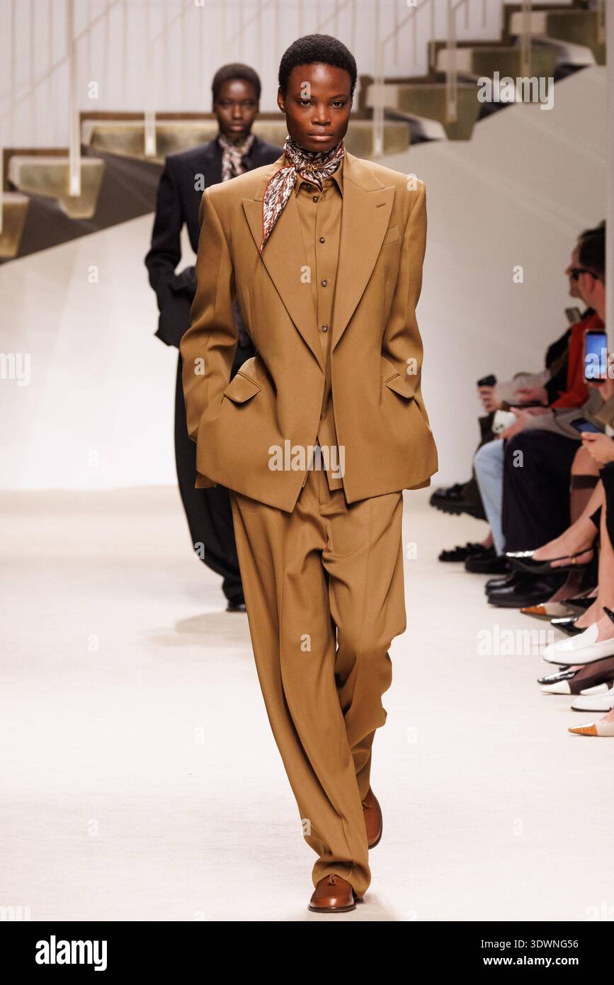 A model walks the runway at the Tod's fashion show during the Milan ...