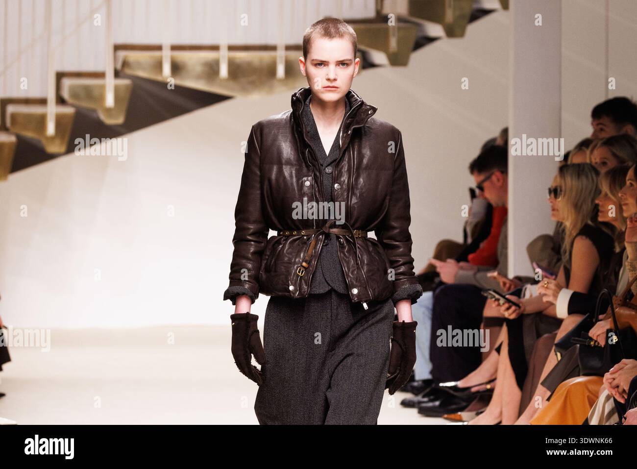A model walks the runway at the Tod's fashion show during the Milan ...
