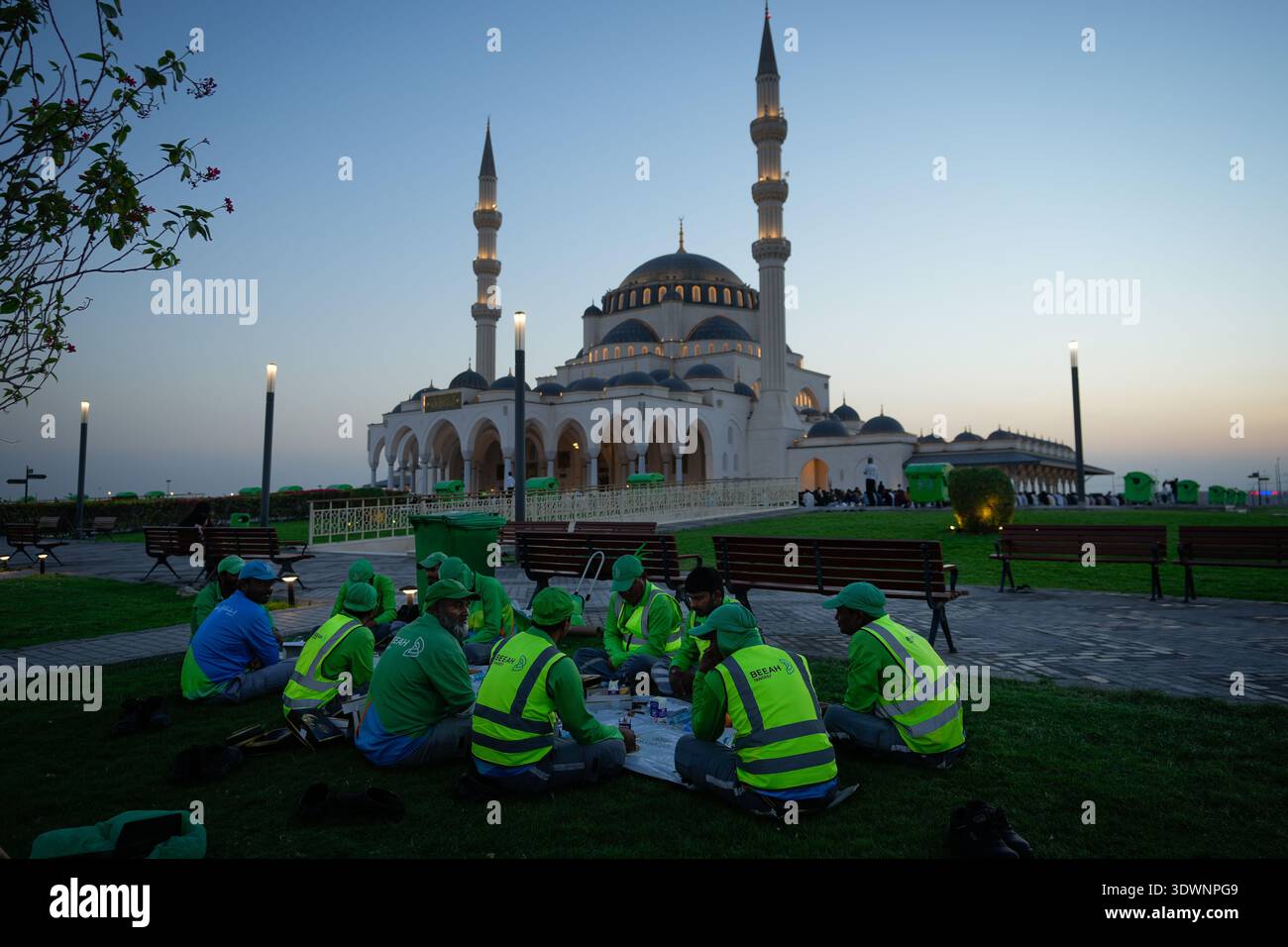 Muslim workers wait before starting Iftar, the meal that breaks the day ...