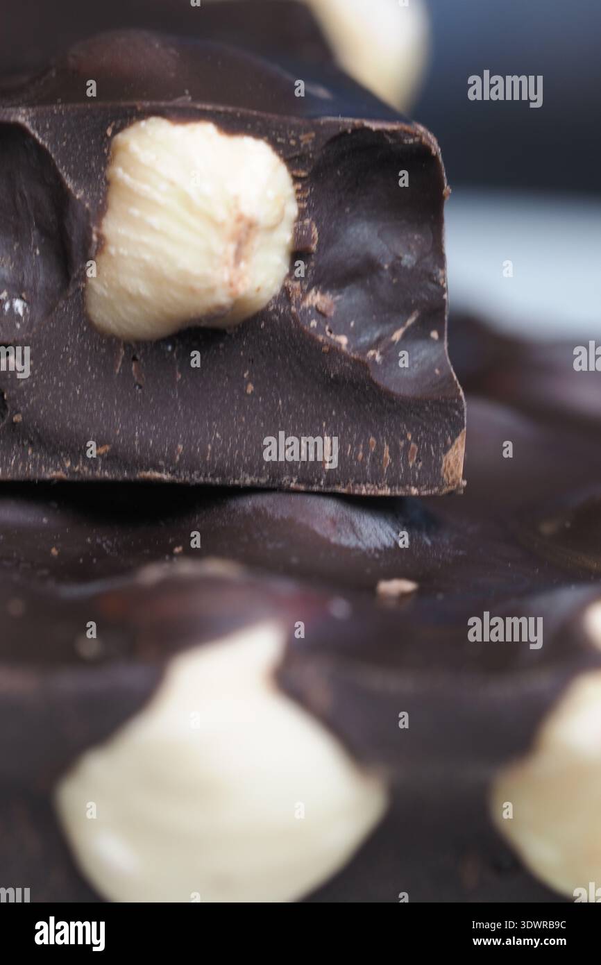 Chocolate bar with nuts on a flat surface Stock Photo