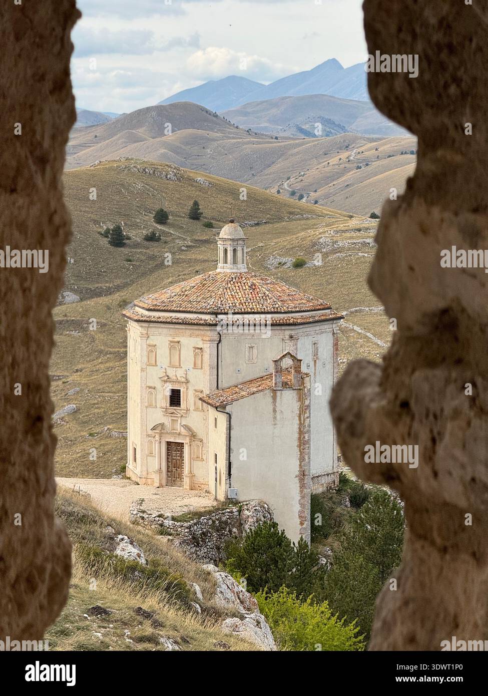 Santa Maria della Pietà chapel on the Campo Imperatore plateau in Gran Sasso National Park, Abruzzo, Italy, surrounded by rolling mountain landscapes. - Smartphone Captured Stock Image