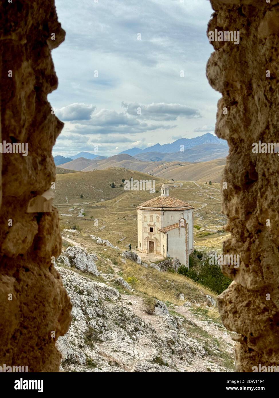 Santa Maria della Pietà chapel on the Campo Imperatore plateau in Gran Sasso National Park, Abruzzo, Italy, surrounded by rolling mountain landscapes. - Smartphone Captured Stock Image