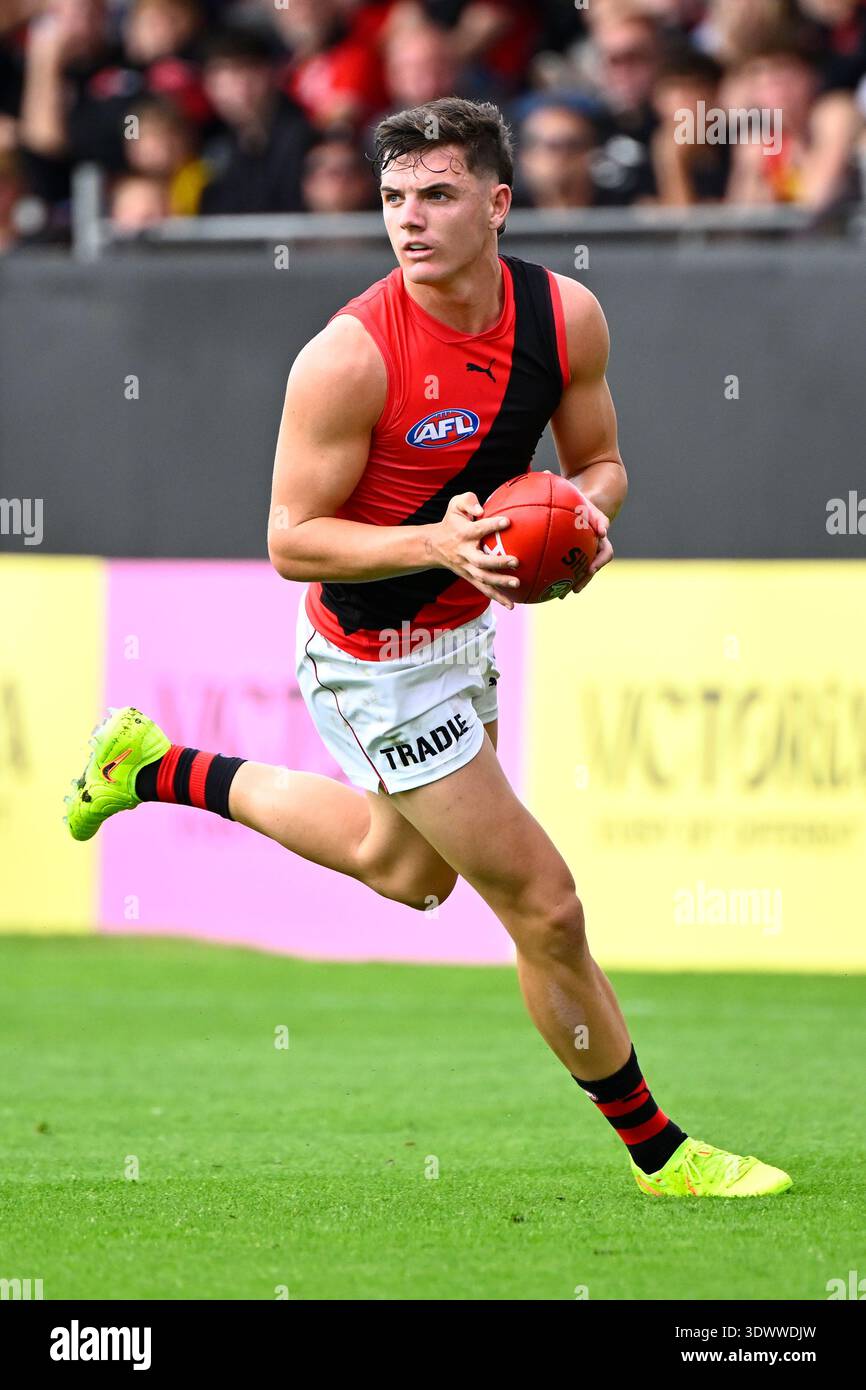 Archie Roberts of the Bombers in action during the AFL Community Series ...