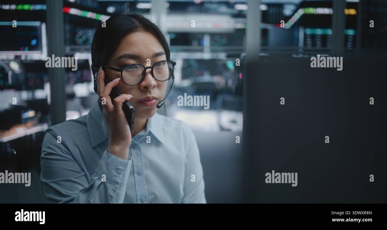 Female asian trader speaks hi-res stock photography and images - Alamy