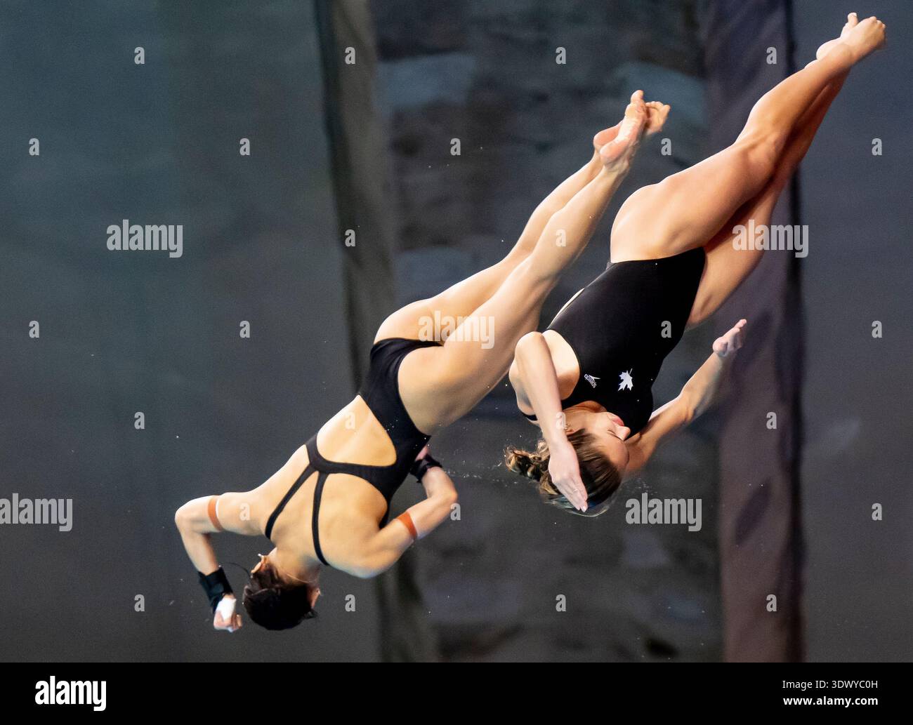 Canada's Katelyn Fung, left, and Kate Miller compete in the women's 10 ...
