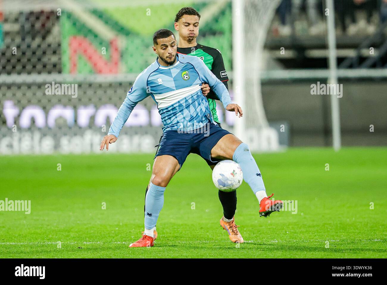 Nijmegen, Netherlands. 28th Feb, 2026. NIJMEGEN, NETHERLANDS - FEBRUARY 28: Mohamed  Ihattaren of Fortuna Sittard battles for possession with Deveron Fonville  of NEC Nijmegen during a Dutch Eredivisie at Goffertstadion on February