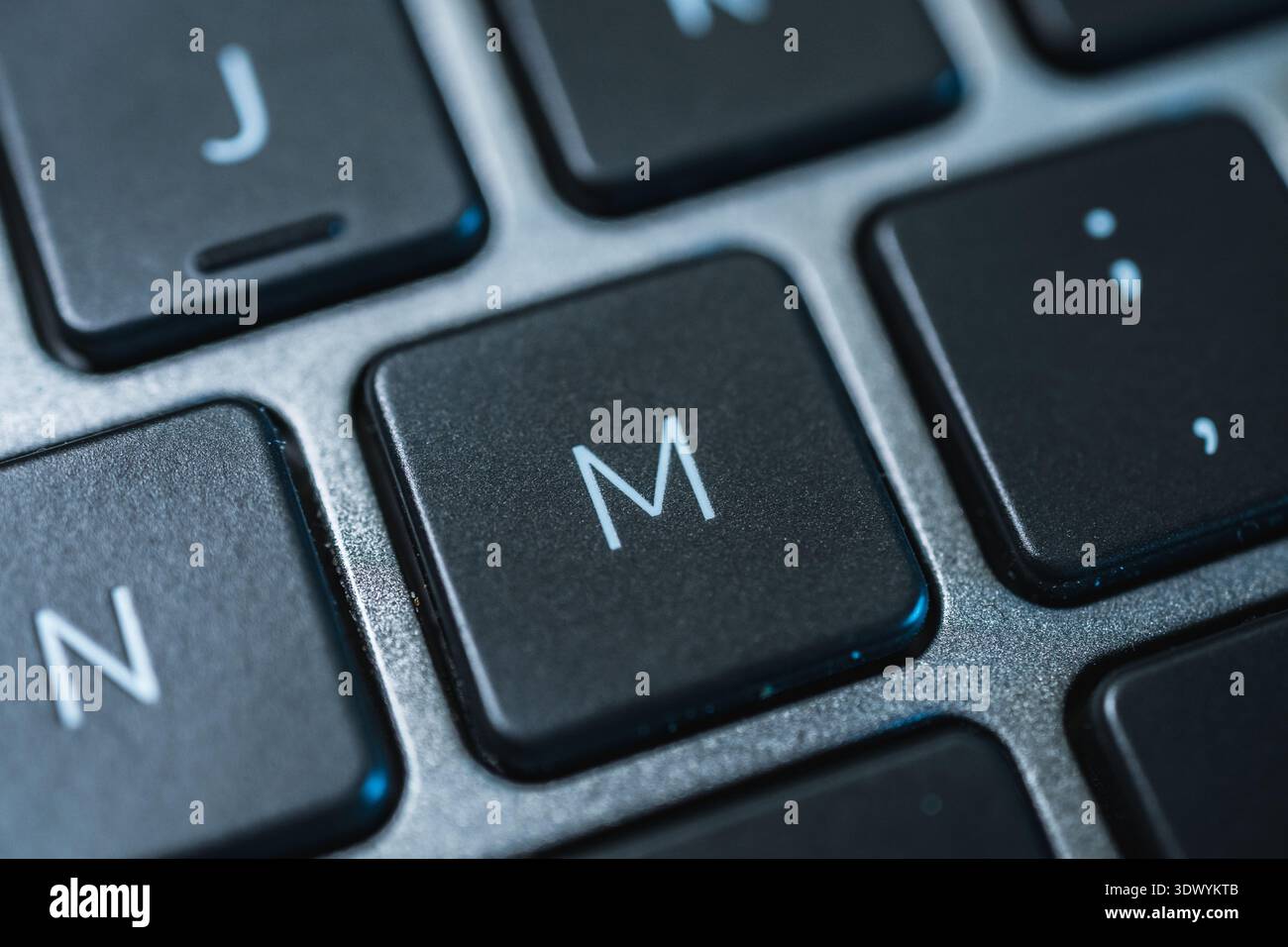 Macro photography of computer keyboard M key Stock Photo - Alamy