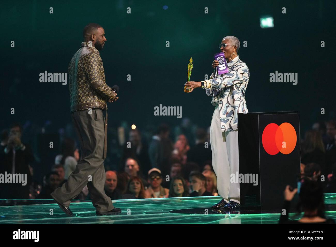 dj-paulette-right-presents-the-best-dance-act-award-to-skepta-left