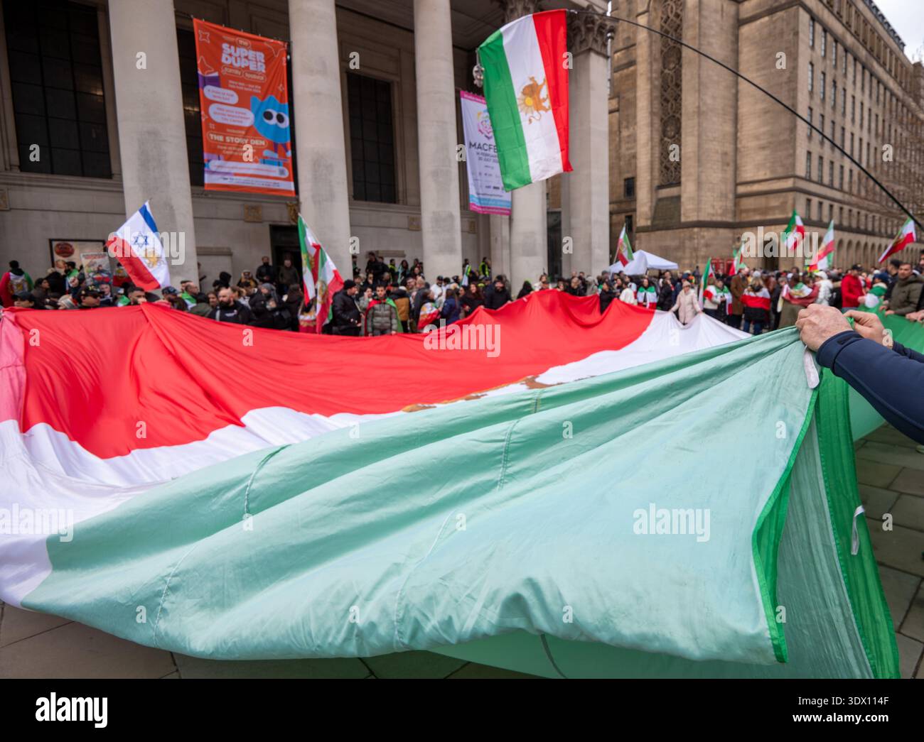 Khamenei Supporters Supporters hold pre revolutionary Iranian flag as they celebrate the ...
