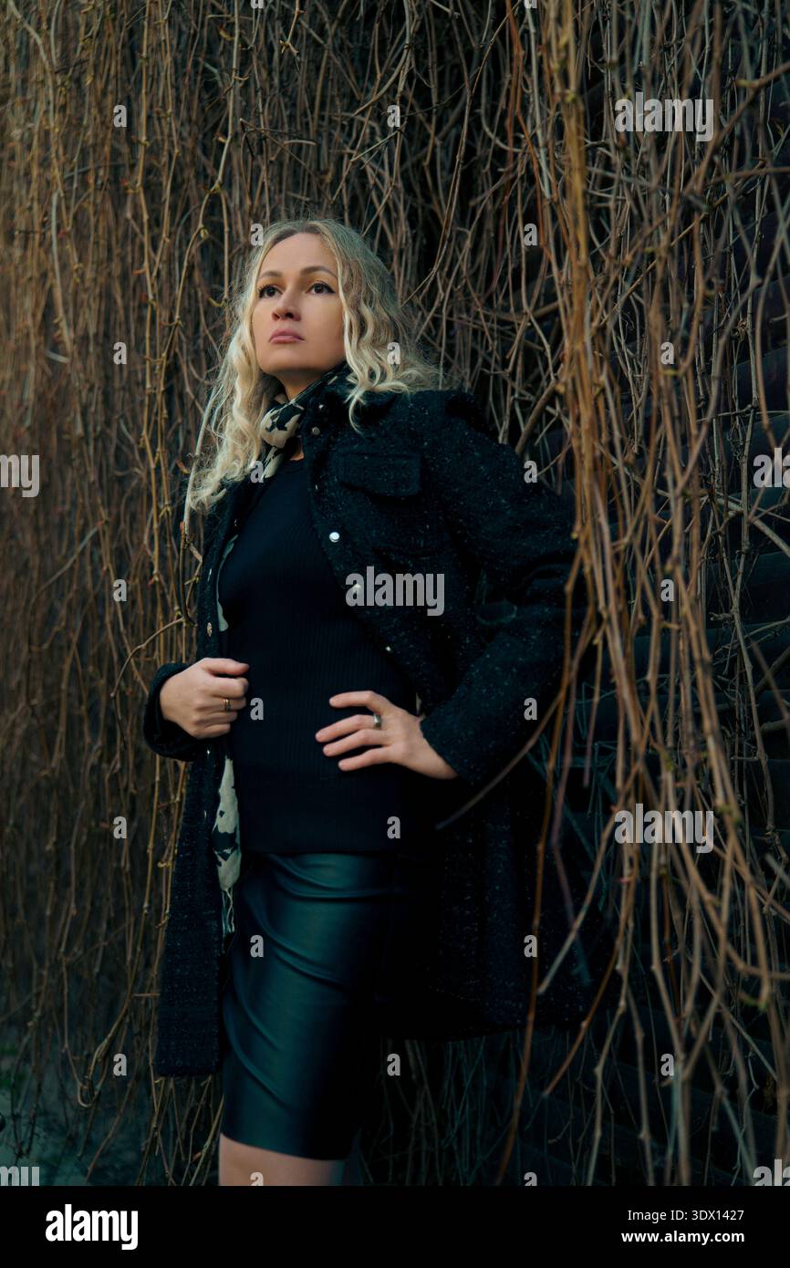 Blonde woman in leather hi-res stock photography and images - Alamy