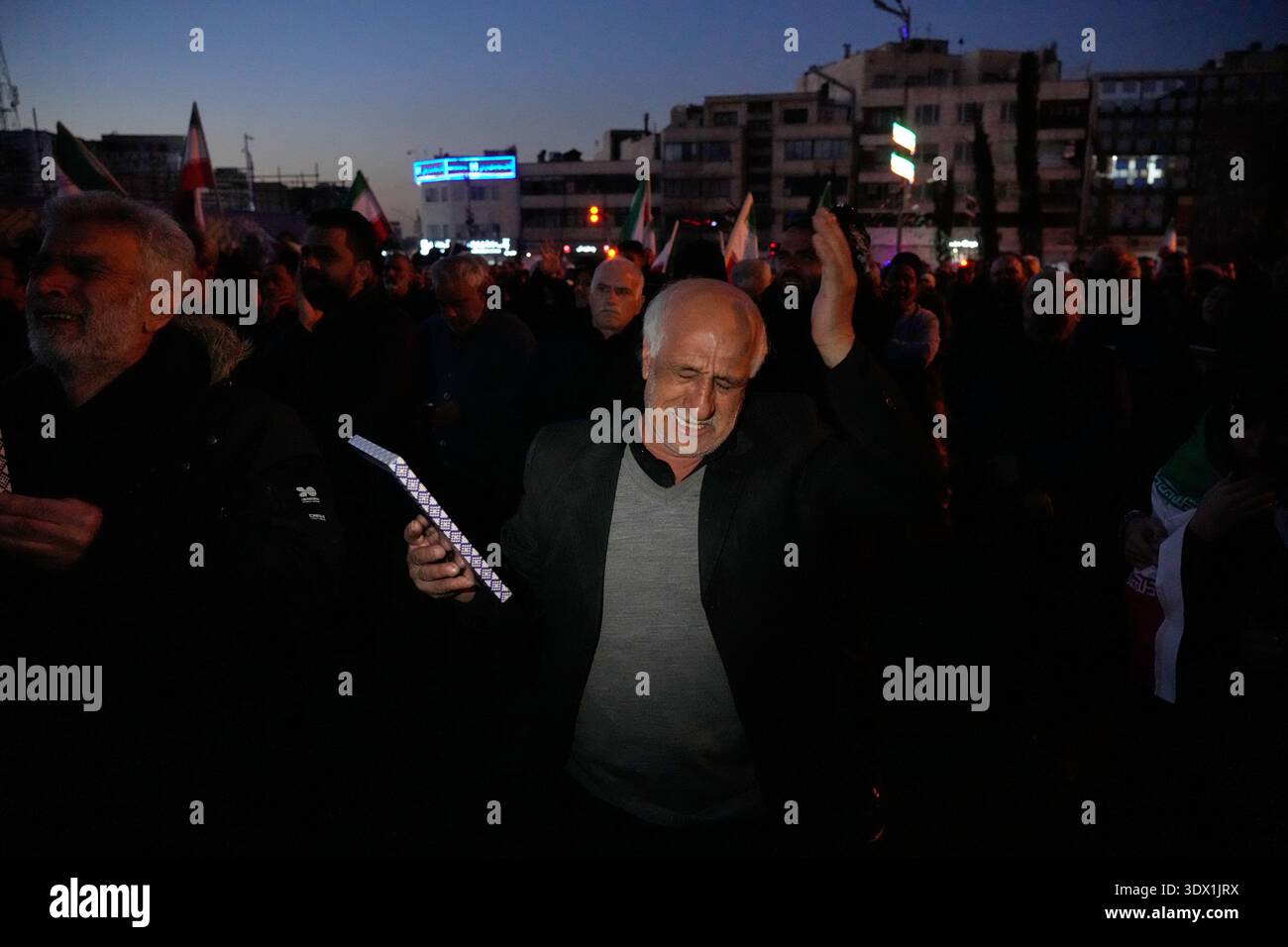 Khamenei Supporters Government supporters mourn in a gathering after state TV officially ...