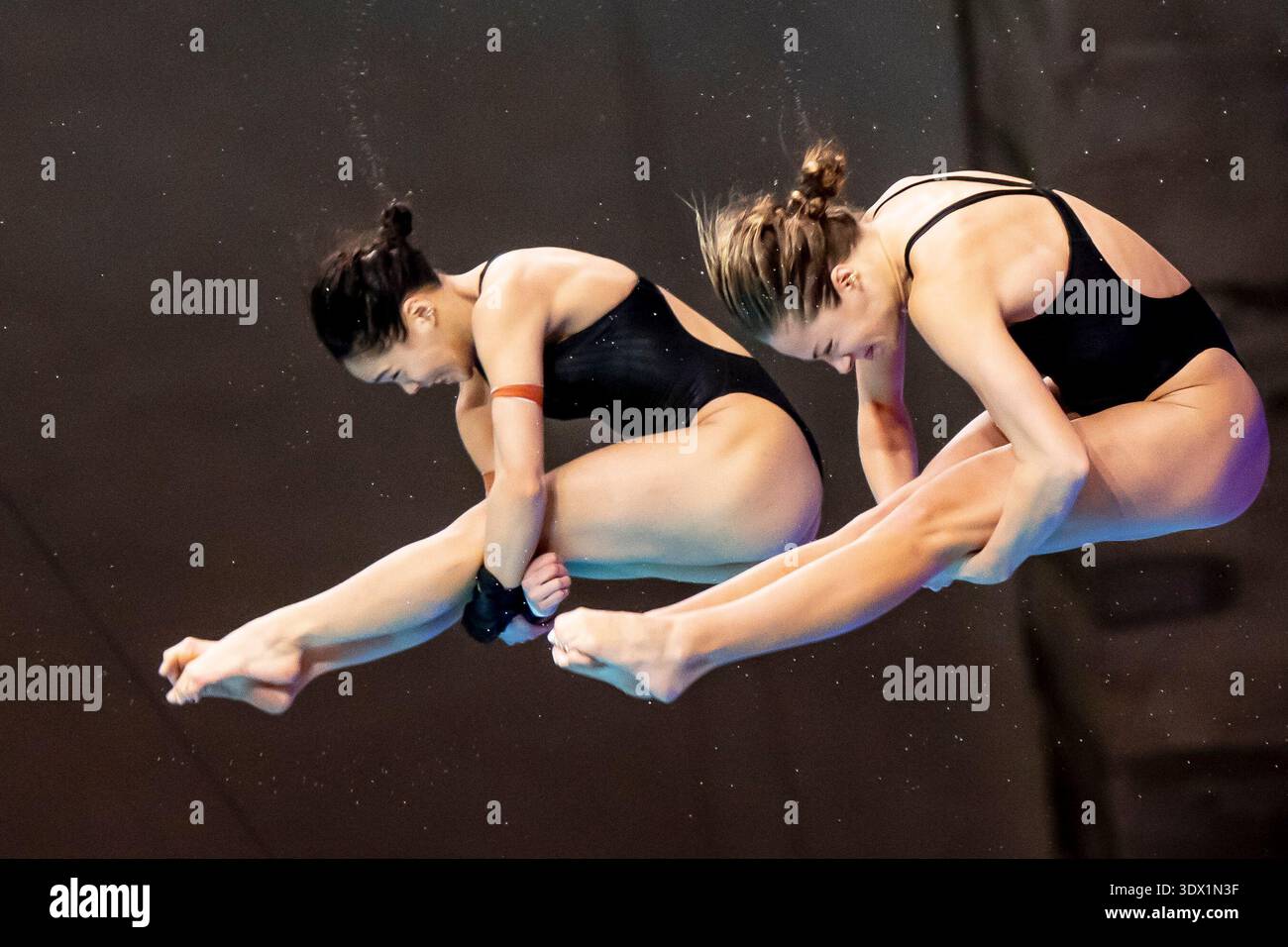 Team Canada's Katelyn Fung, left, and Kate Miller compete in the women ...