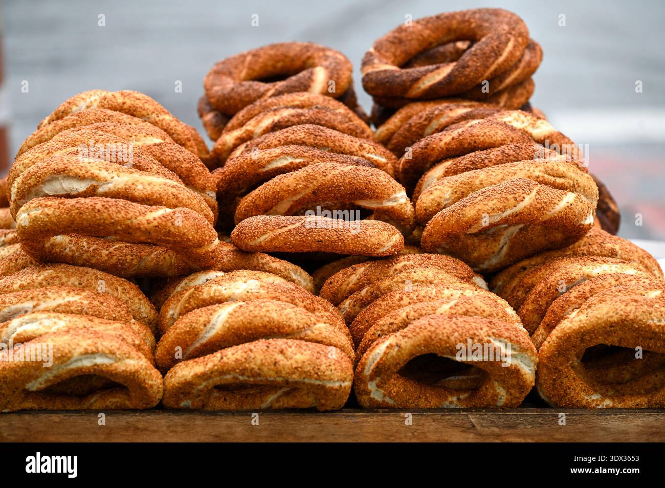 Traditional Turkish white bread Simit with sesame at a street market in ...