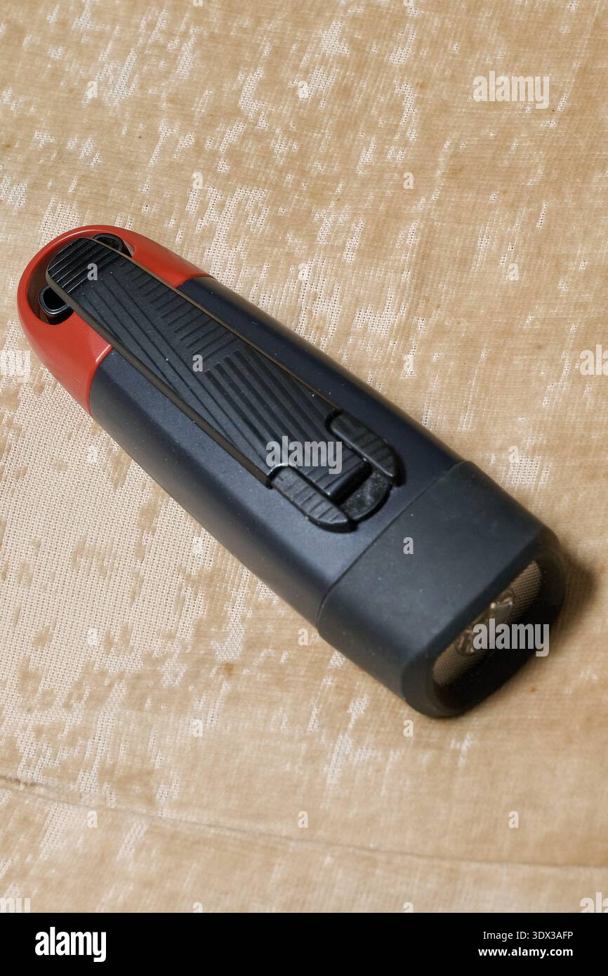 Rechargeable flashlight via dynamo and USB Stock Photo