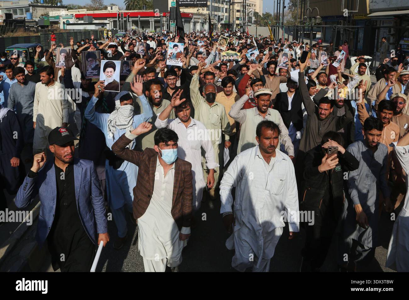 Shiite Muslims chant anti U.S slogans during a rally to condemn the ...