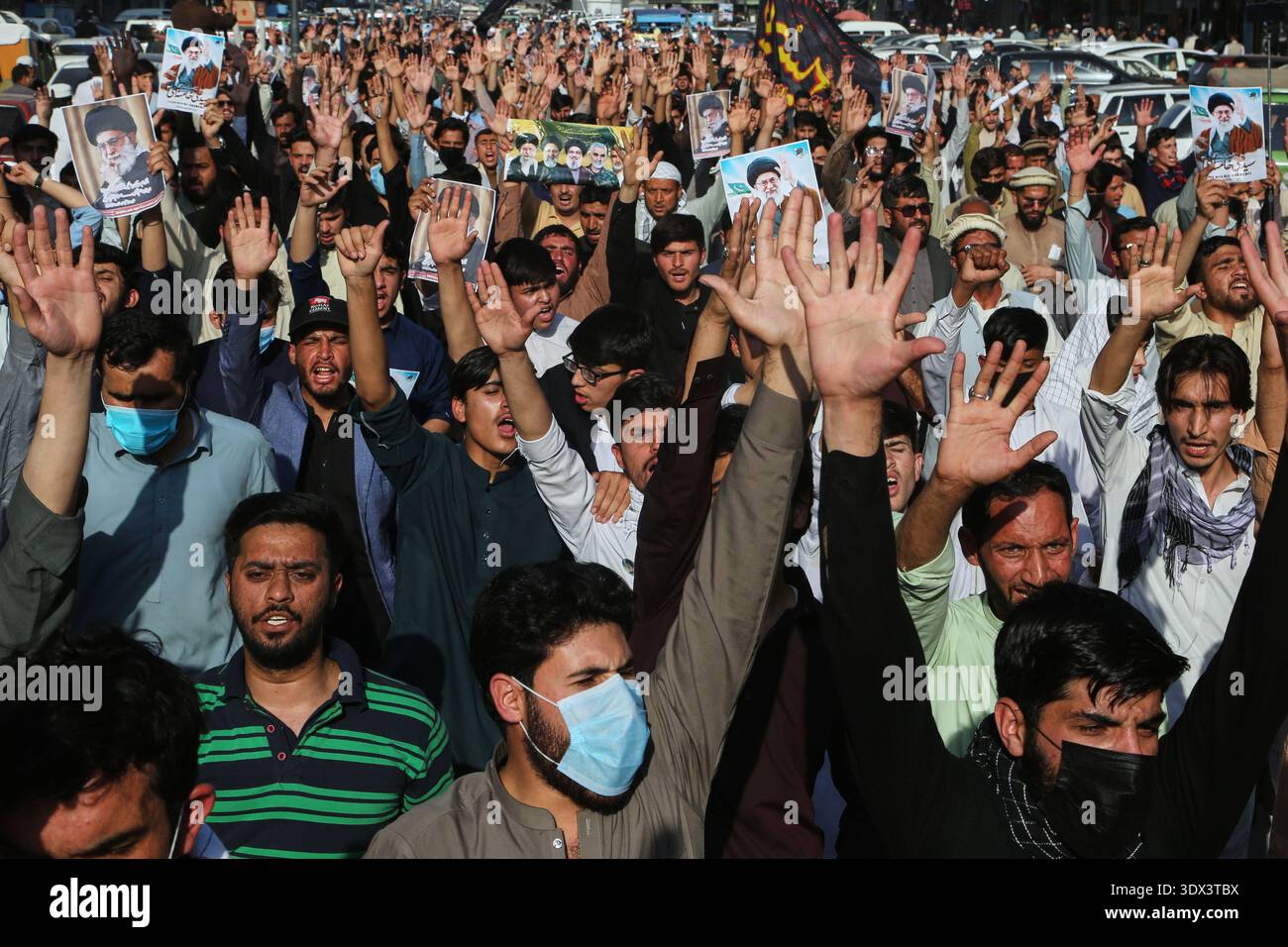 Shiite Muslims chant anti U.S slogans during a rally to condemn the ...