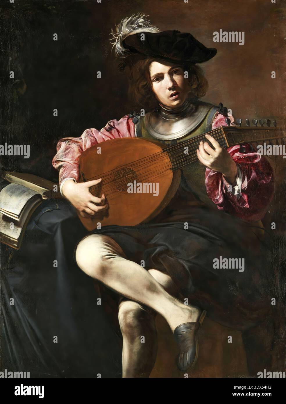 Valentin de Boulogne Lute Player (c.162526) oil painting, dramatic Caravaggesque scene with musician in rich chiaro Stock Photo