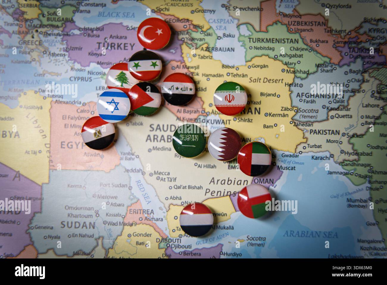 Political map of the Middle East featuring multiple national flag pins ...