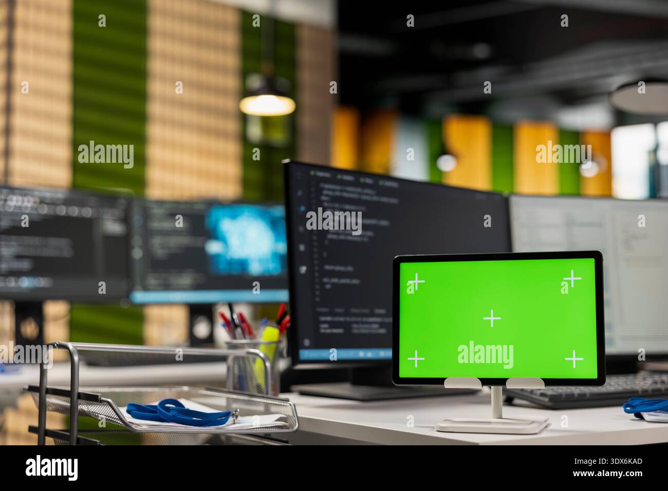 Green screen tablet running advanced AI algorithms in empty startup office. Artificial intelligence coding platform used to deploy deep learning models on chroma key device Stock Photo