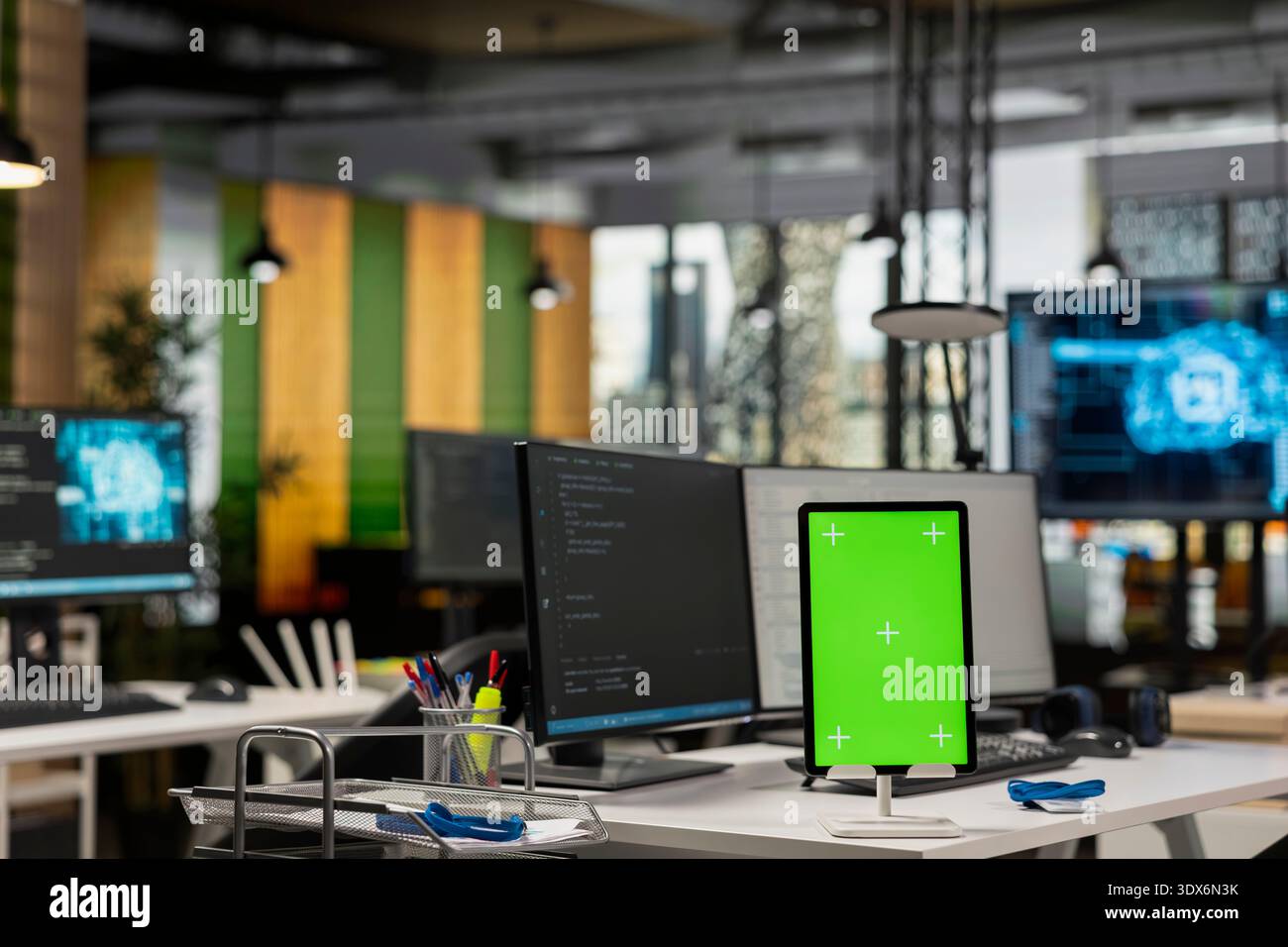 Isolated screen tablet on startup office desk showing deep learning programming languages written by developers. Mockup device in artificial intelligence company workspace used for code testing Stock Photo