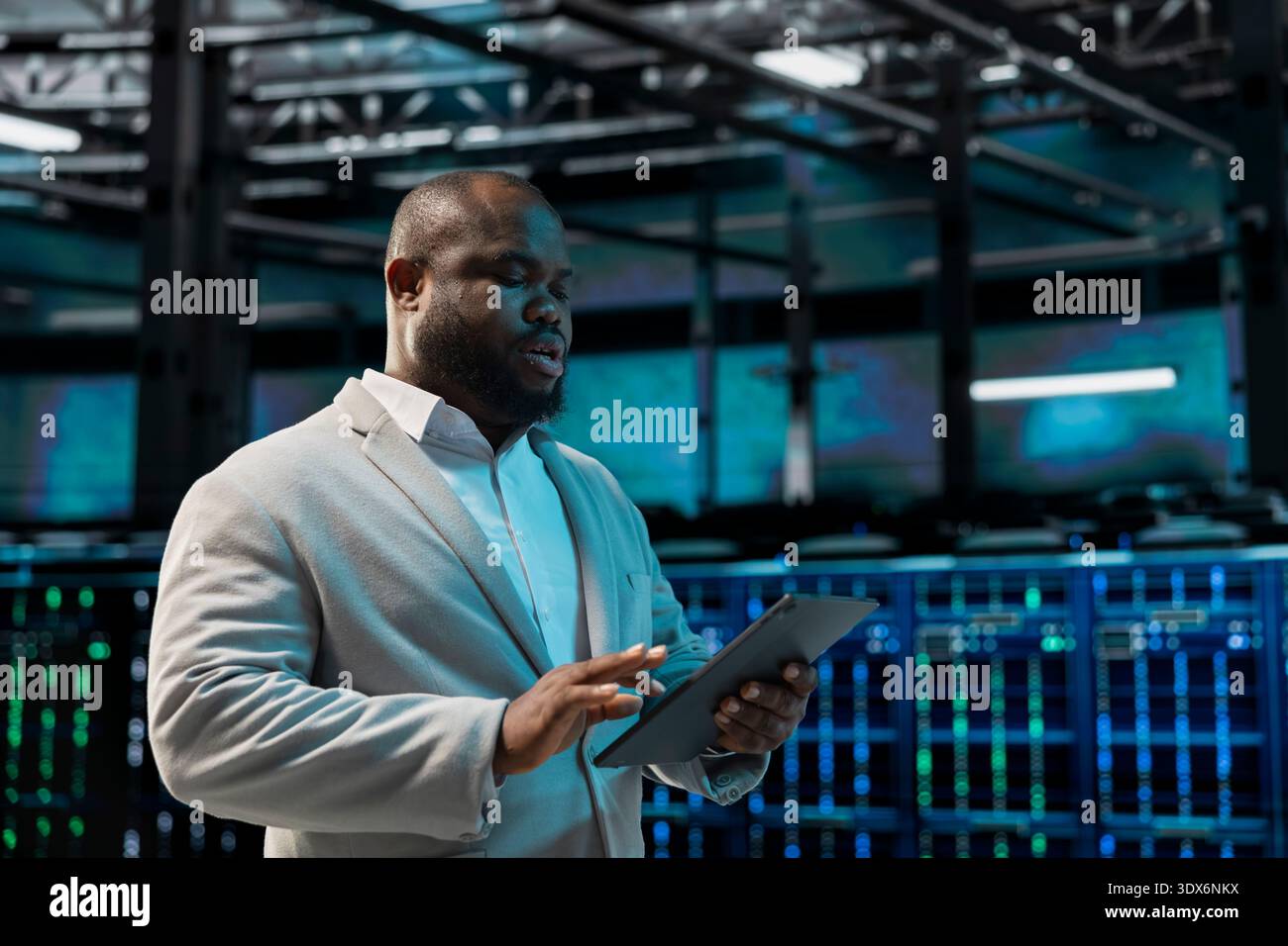 Computer scientist in data center runs system diagnostic tests on device, tracking resource utilization. Man in server hub scanning equipment, fixing network issues affecting rigs performance Stock Photo