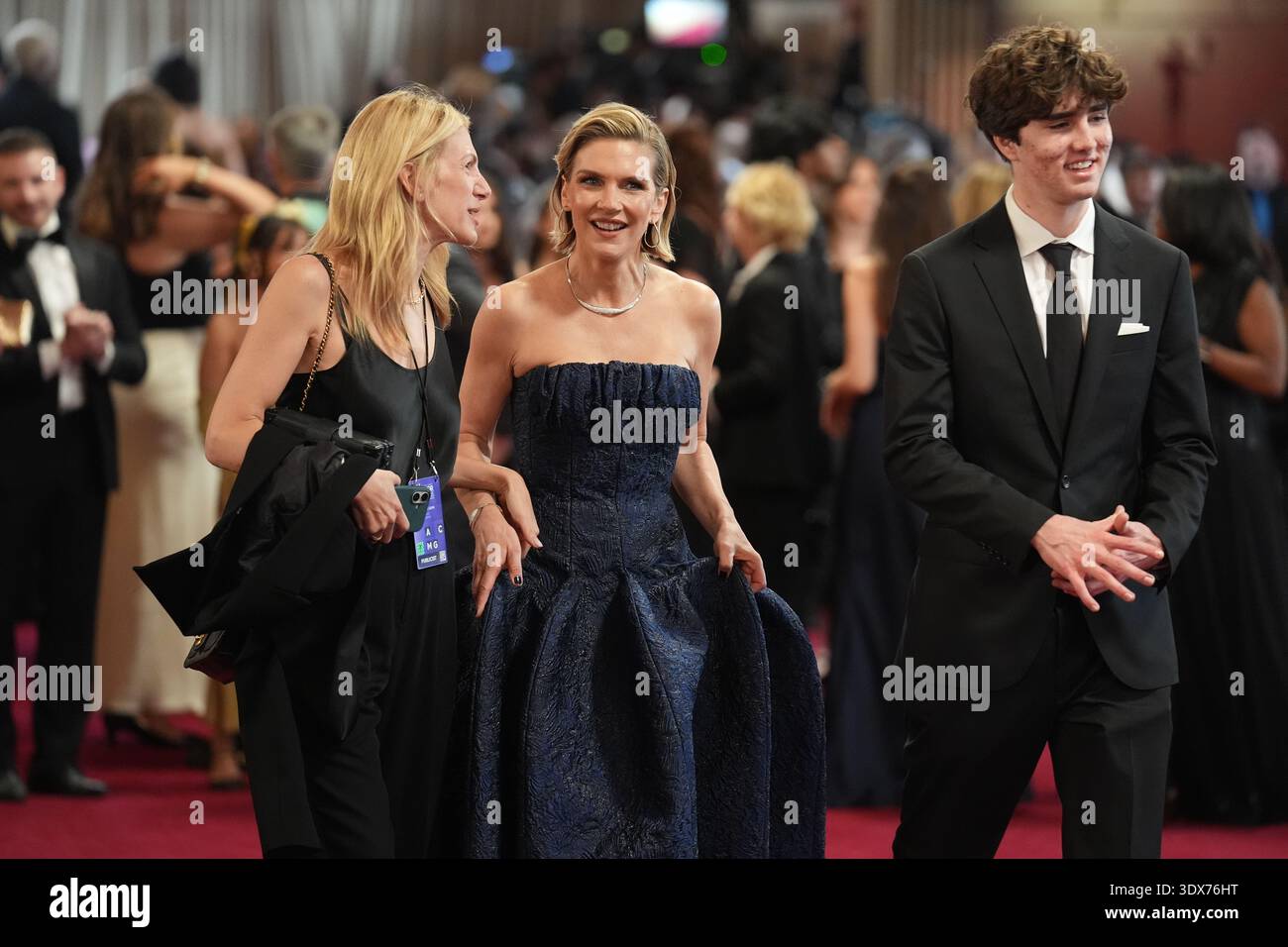 Rhea Seehorn, center, arrives at the 32nd Annual Actor Awards on Sunday ...