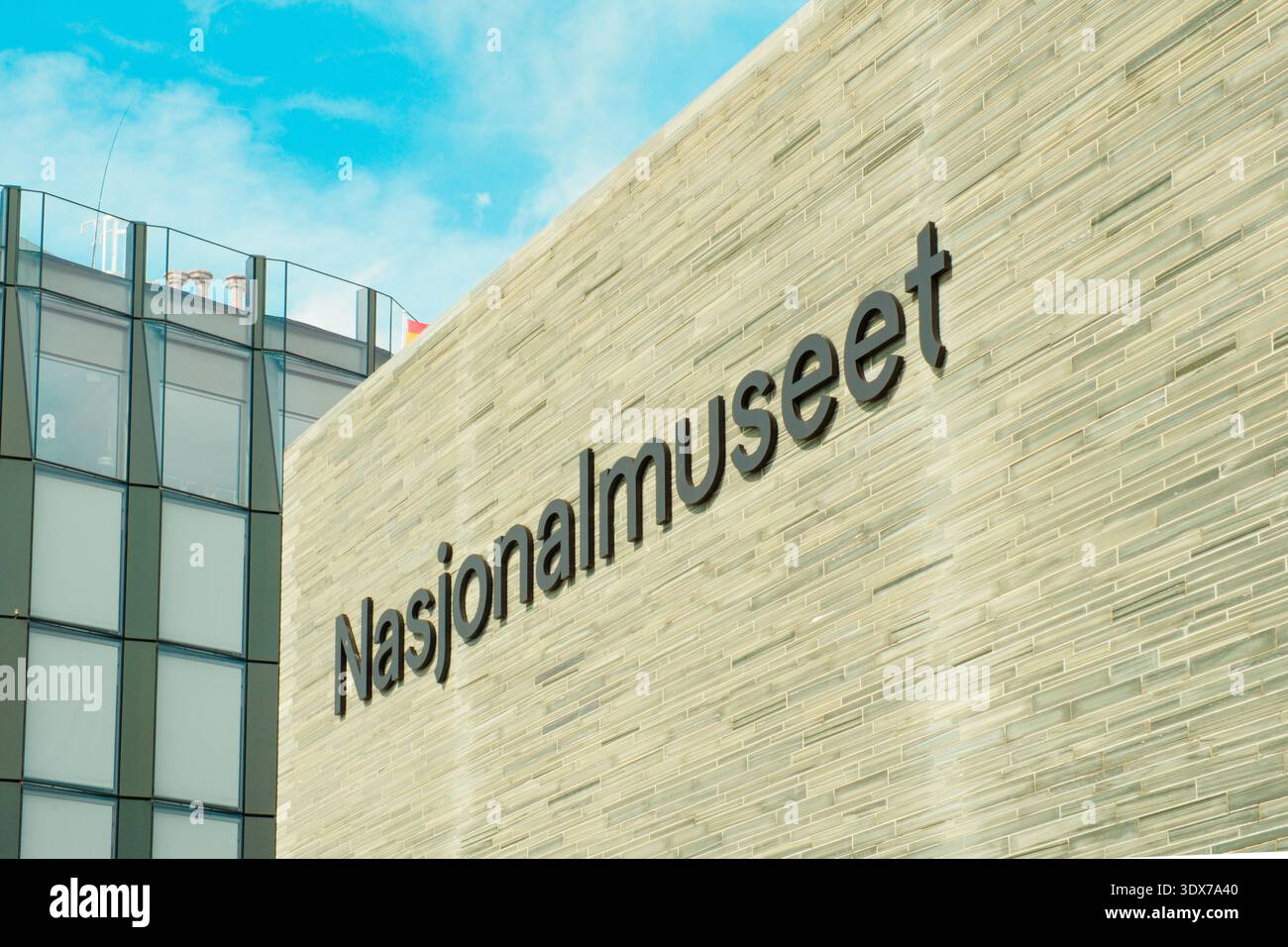 Oslo, Norway - June 28, 2024: Exterior view of the main entrance to the National Museum (Nasjonalmuseet) featuring its distinctive slate facade and vi Stock Photo