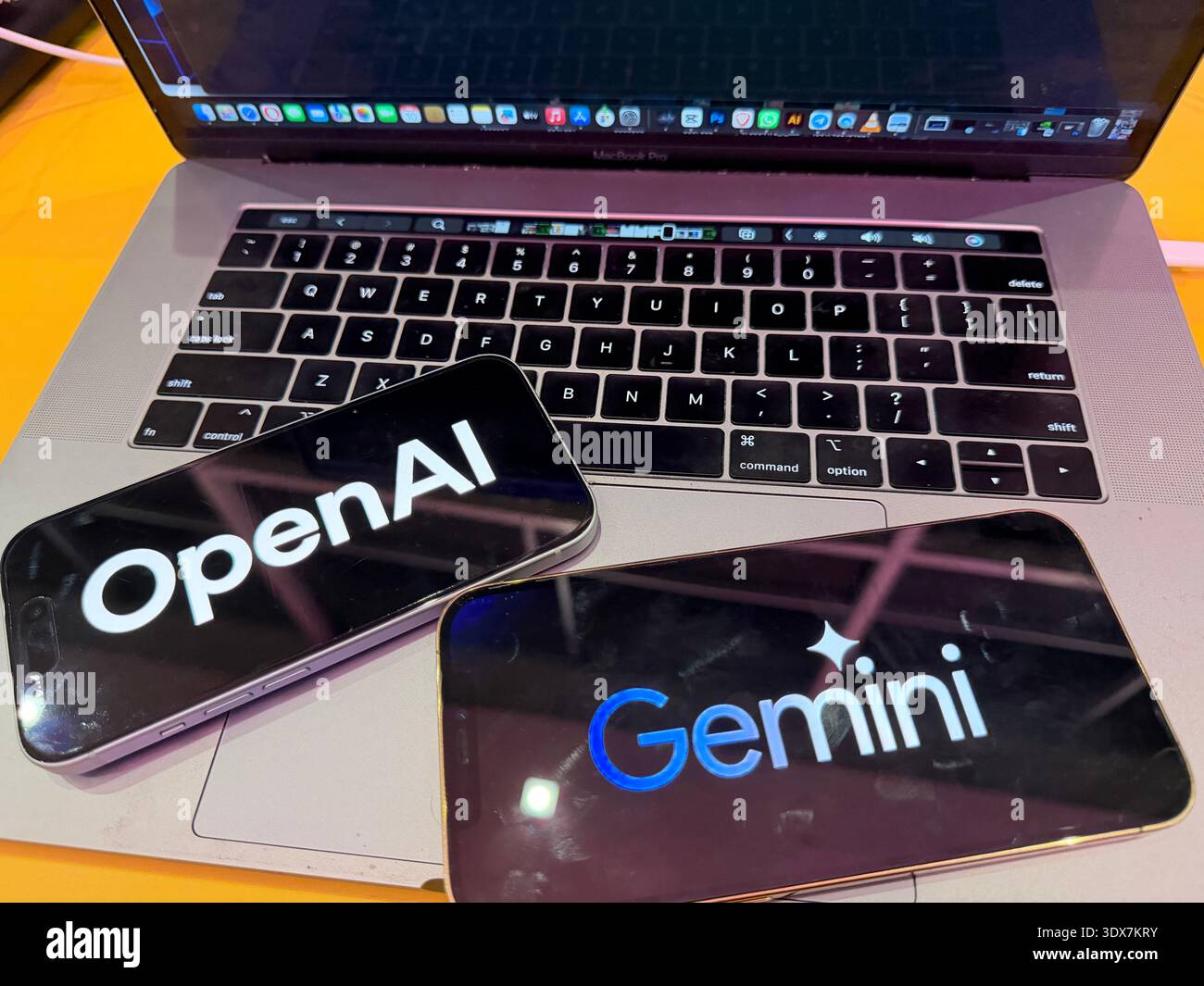 OpenAI and Google Gemini logos on digital screens. This editorial image ...