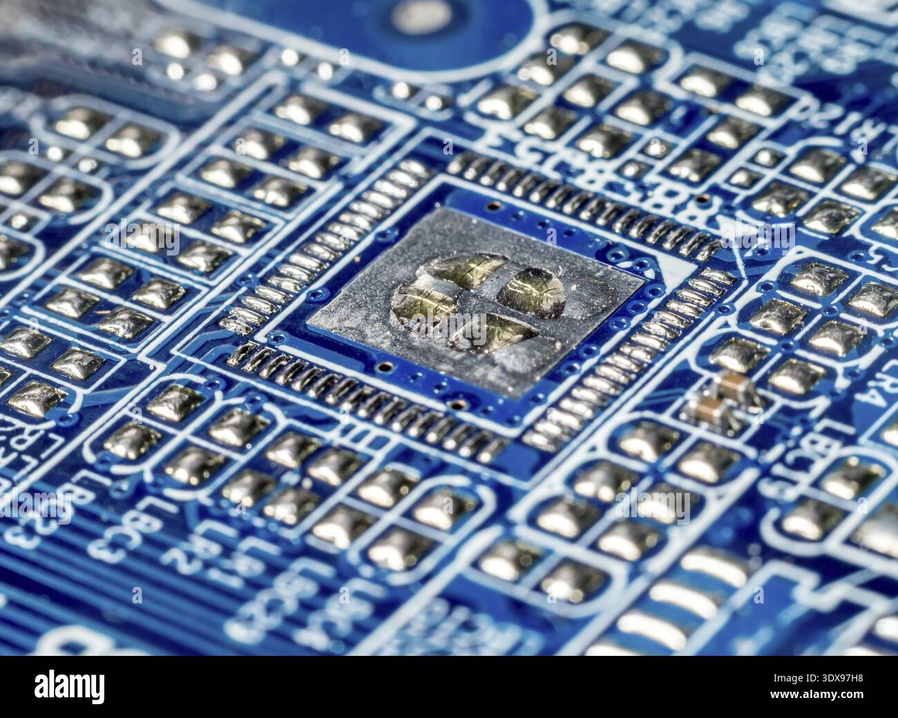 Closeup of electronic elements embedded into PCB board Stock Photo