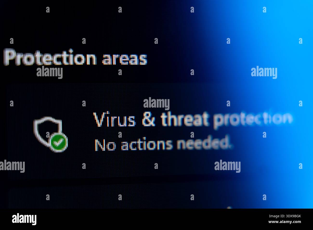 Windows security interface showing virus and threat protection status with green checkmark icon, cybersecurity software monitoring and digital safety Stock Photo