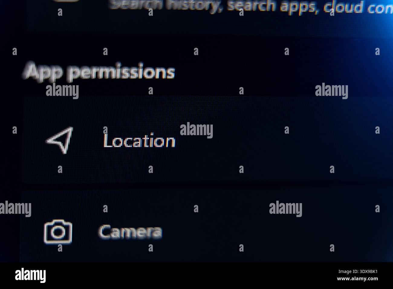Smartphone or computer app permissions settings menu displaying location and camera access options, digital privacy and data security management conce Stock Photo
