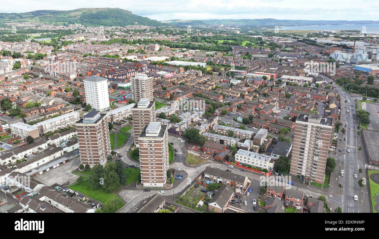 Aerial view of dense urban sprawl meets the coast, high rise buildings ...