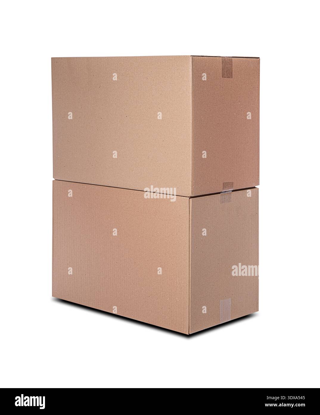 Two identical brown cardboard boxes are stacked vertically against a white background. Stock Photo
