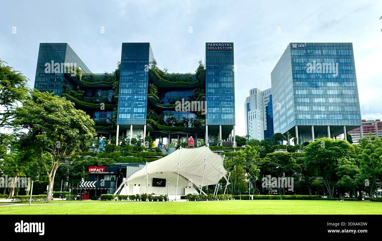Parkroyal Collection Pickering hotel with vertical gardens and UOL tower next to Hong Lim Park in central Singapore - Smartphone Captured Stock Image