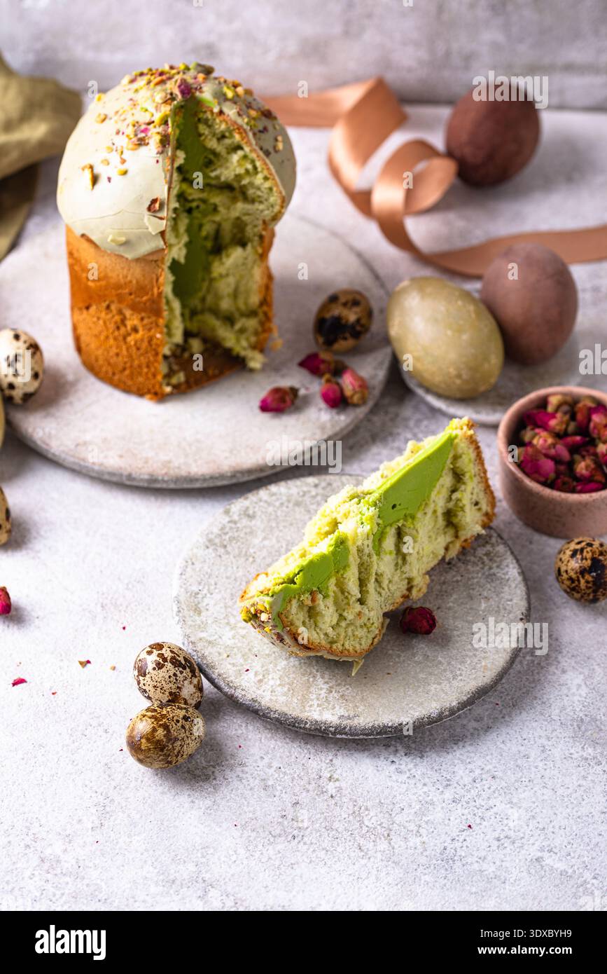 Traditional Easter cake kulich with pistachio Stock Photo