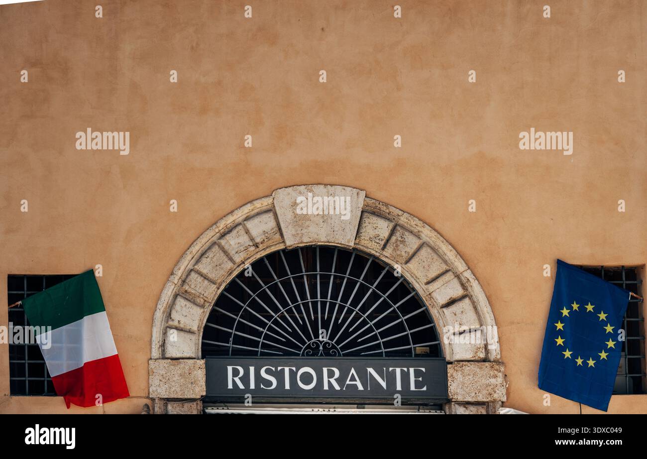 Italian restaurant sign with Italy and European Union flags waving ...