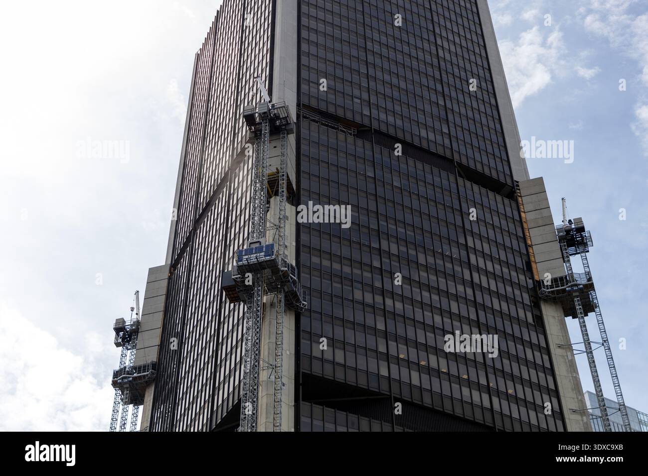 Montreal, Canada - July 4, 2025: Skyscraper maintenance with ...
