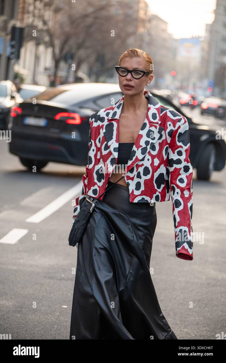 Guests arriving at Moschino Fashionshow during Milan Fashionweek AW 26 Stock Photo