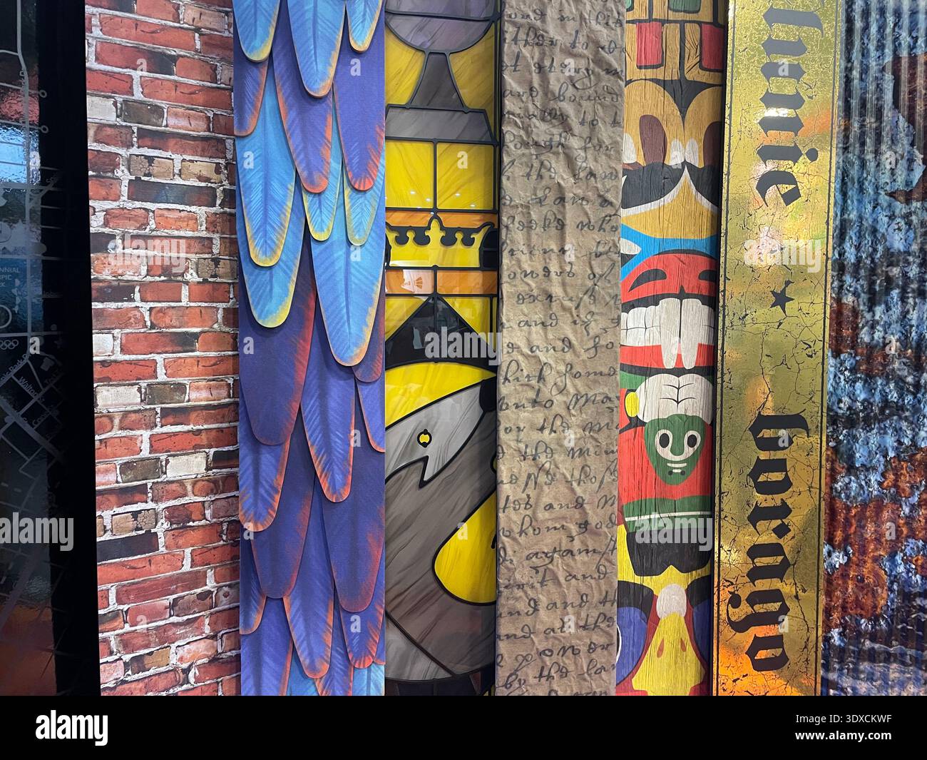 Colorful vertical collage of mixed textures and patterns on decorative panels, abstract background with layered materials. - Smartphone Captured Stock Image