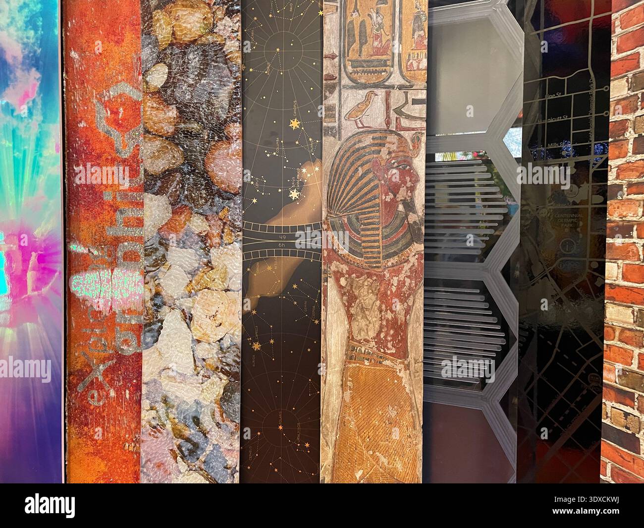 Colorful vertical collage of mixed textures and patterns on decorative panels, abstract background with layered materials. - Smartphone Captured Stock Image